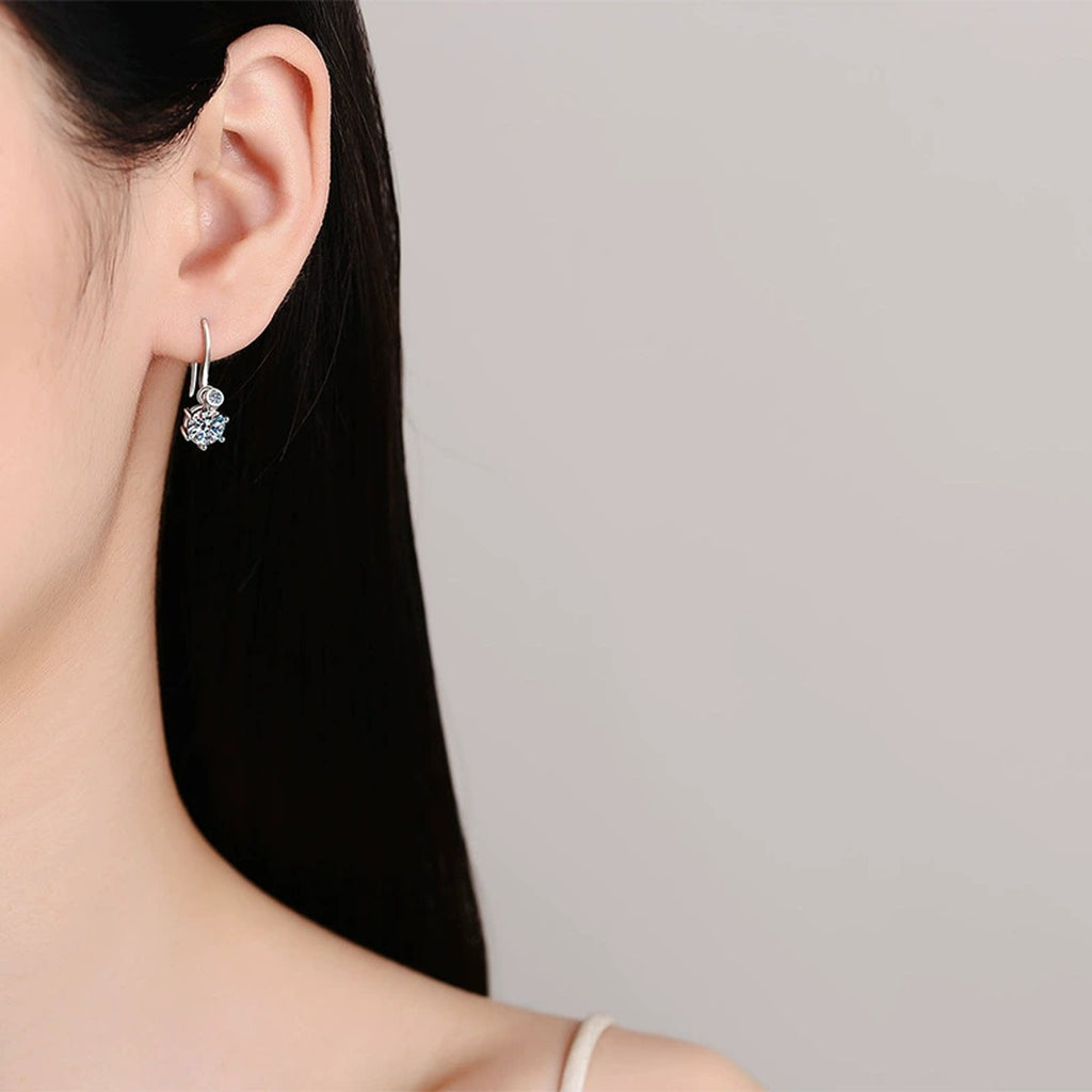 Round Moissanite Hook Drop Earrings in Rhodium-Plated S925 sterling silver worn on ear by model showing scale, placement, and hook drop earrings styling