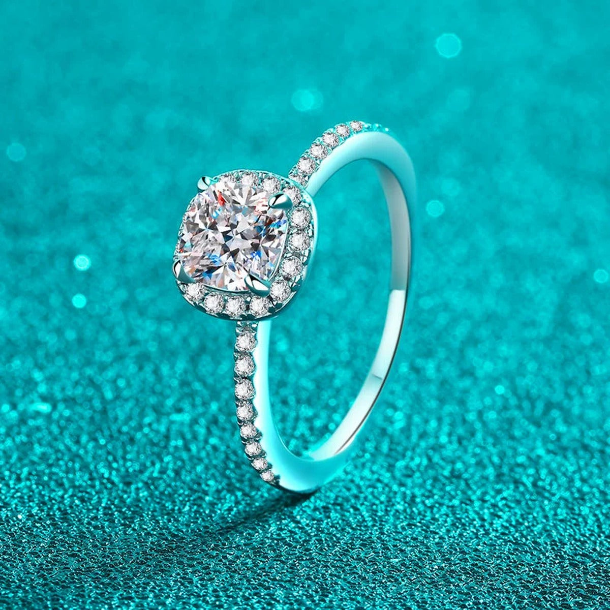 Cushion Cut Moissanite Halo Engagement Ring with CZ in Rhodium-Plated S925 Sterling Silver blue display product photo showing the moissanite setting, stone cut, and band profile