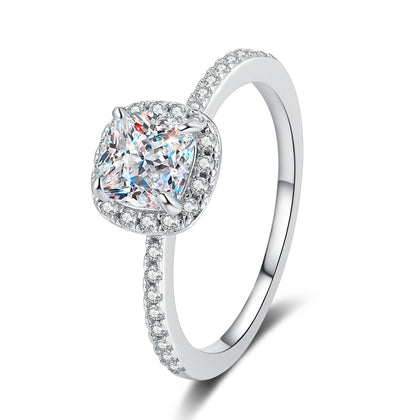 Cushion Cut Moissanite Halo Engagement Ring with CZ in Rhodium-Plated S925 Sterling Silver clean white background product photo showing the ring silhouette and moissanite setting