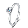 Round Moissanite Solitaire Ring in rhodium-plated S925 sterling silver on clean white background