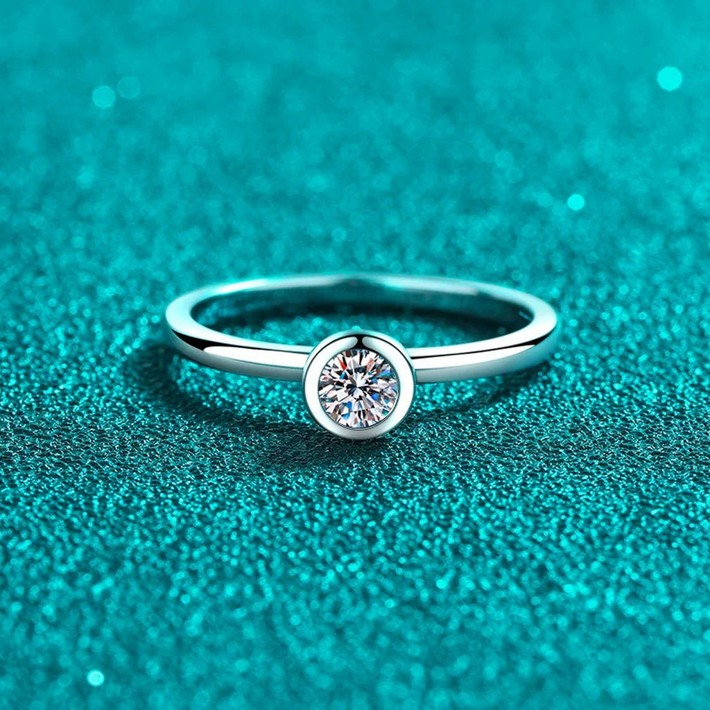 Round Moissanite Solitaire Ring product view showing moissanite setting and metal finish