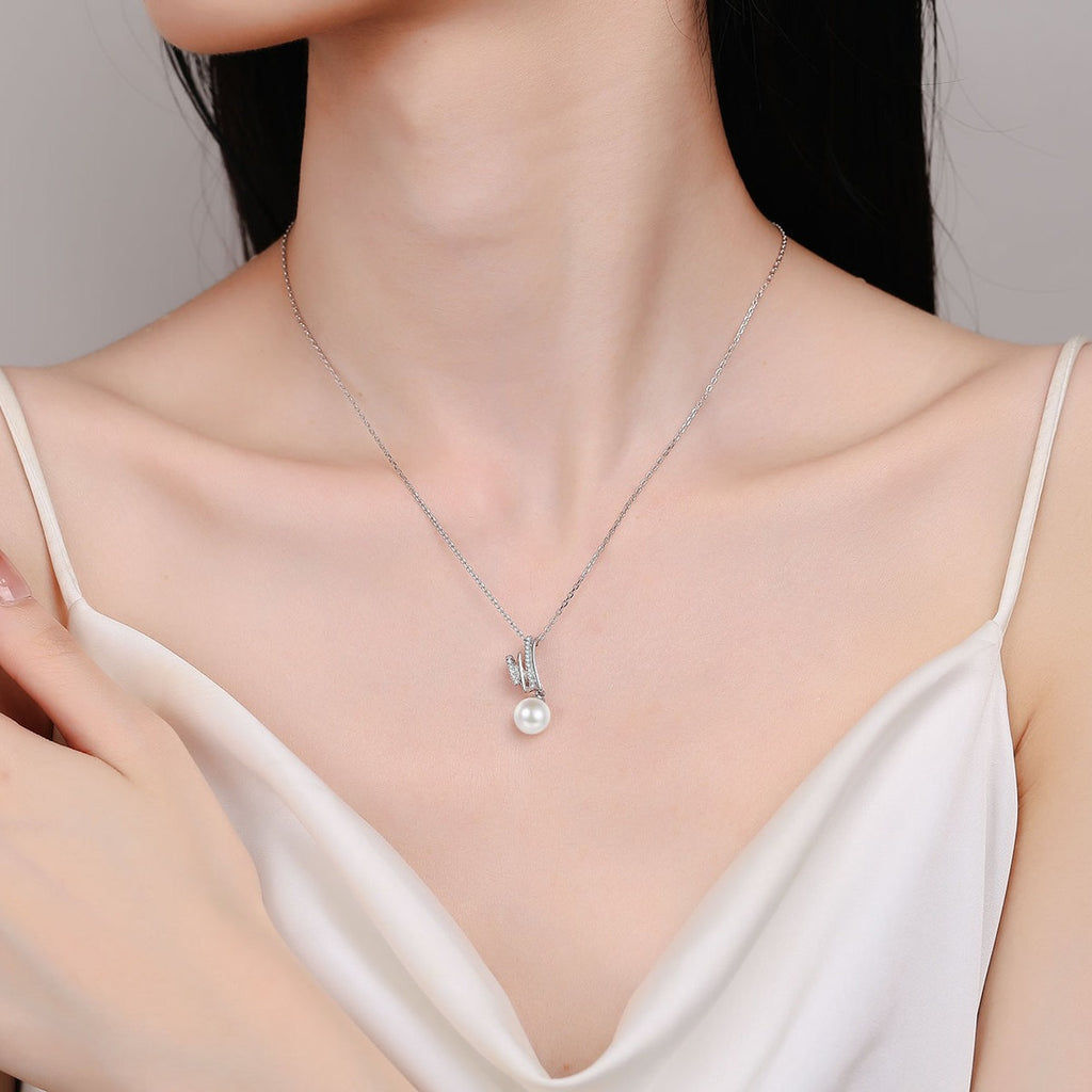 Triple Line Moissanite Pearl Pendant Necklace in Rhodium-Plated S925 sterling silver neckline model view showing pendant scale and adjustable chain