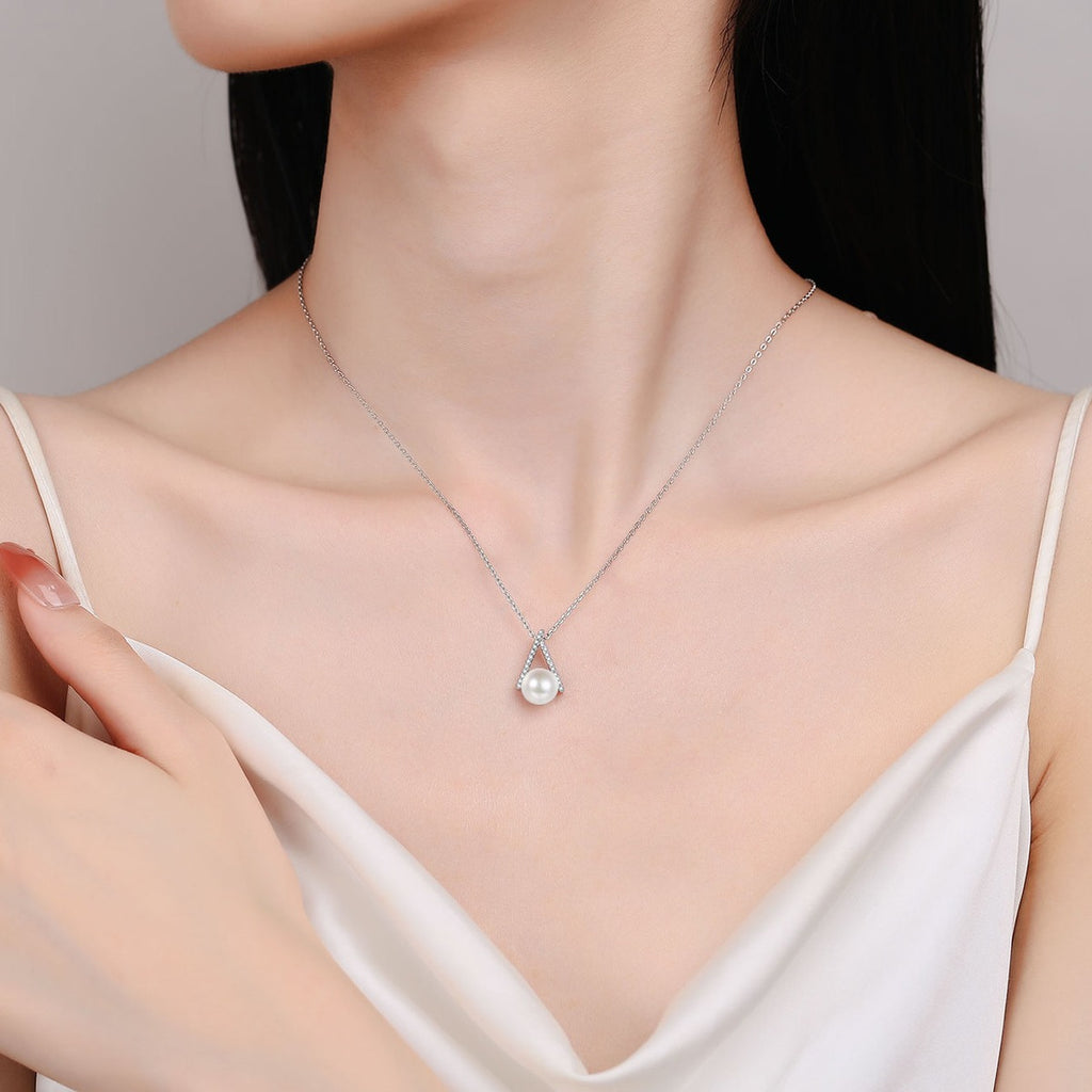 Teardrop Moissanite Pearl Pendant Necklace in Rhodium-Plated S925 sterling silver neckline model view showing pendant scale and adjustable chain