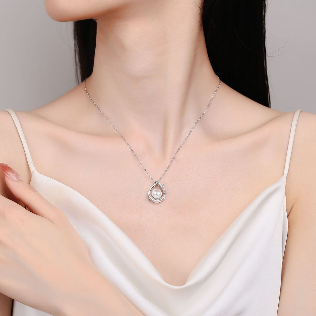 Open Teardrop Moissanite Pearl Necklace in Rhodium-Plated S925 sterling silver neckline model view showing pendant scale and adjustable chain