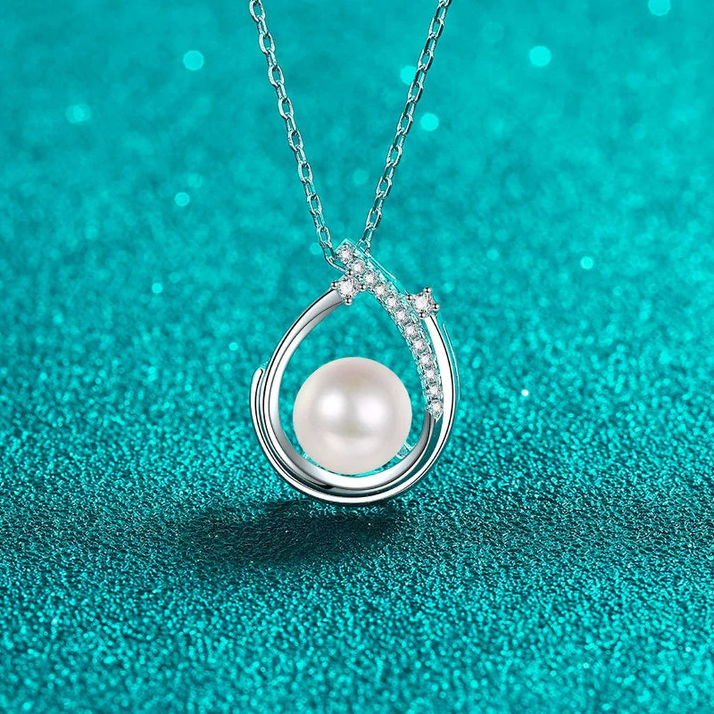 Open Teardrop Moissanite Pearl Necklace in Rhodium-Plated S925 sterling silver blue display scene showing chain and stone layout