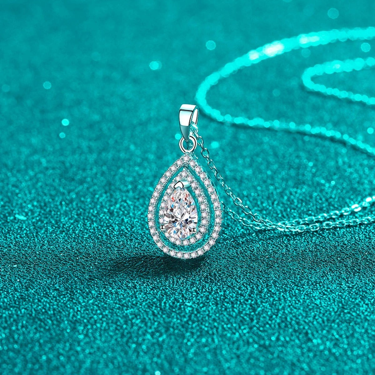 Pear Cut Halo Moissanite Pendant Necklace with CZ in Rhodium-Plated S925 sterling silver angled product detail view