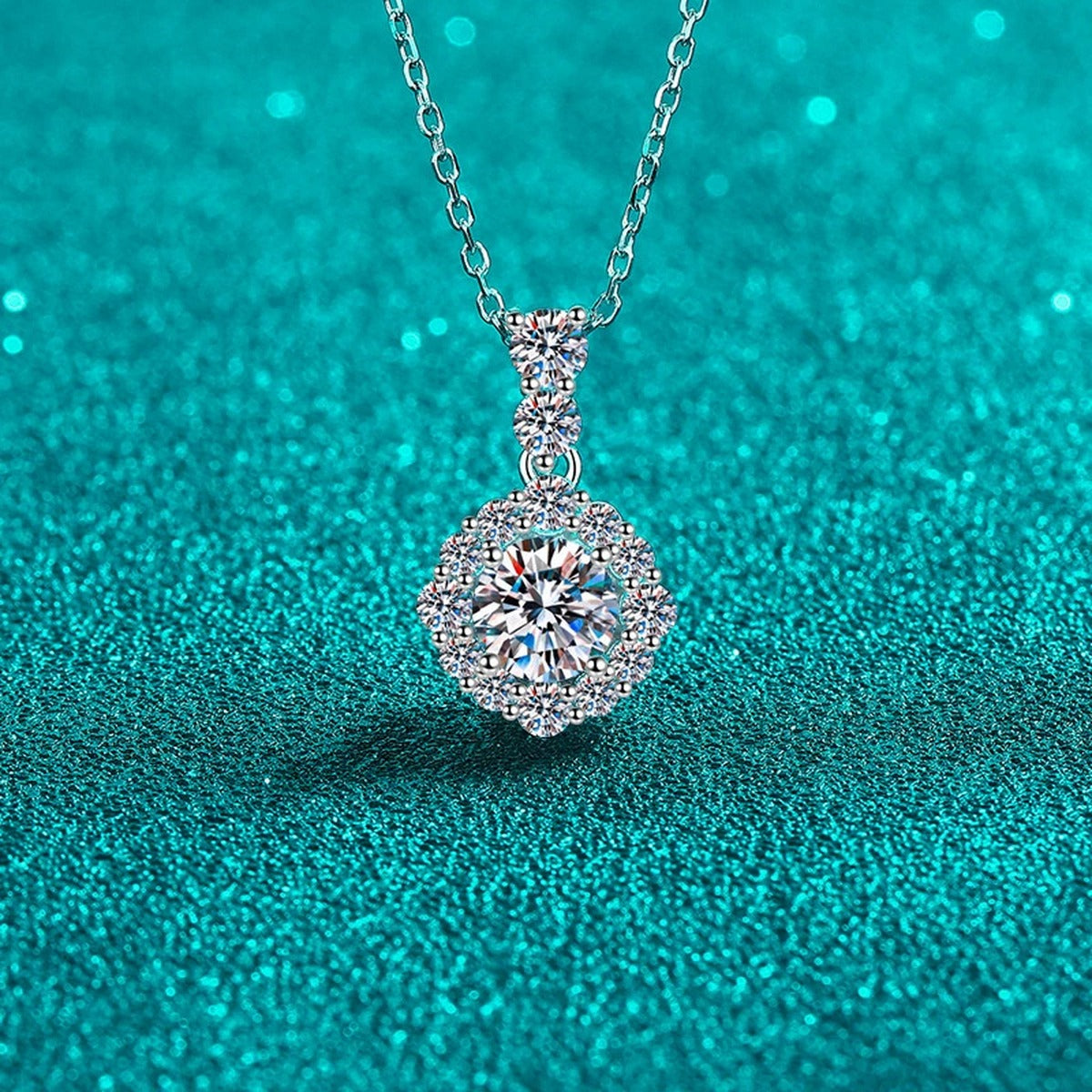 Round Halo Moissanite Pendant Necklace with CZ in Rhodium-Plated S925 sterling silver blue display scene showing chain and stone layout