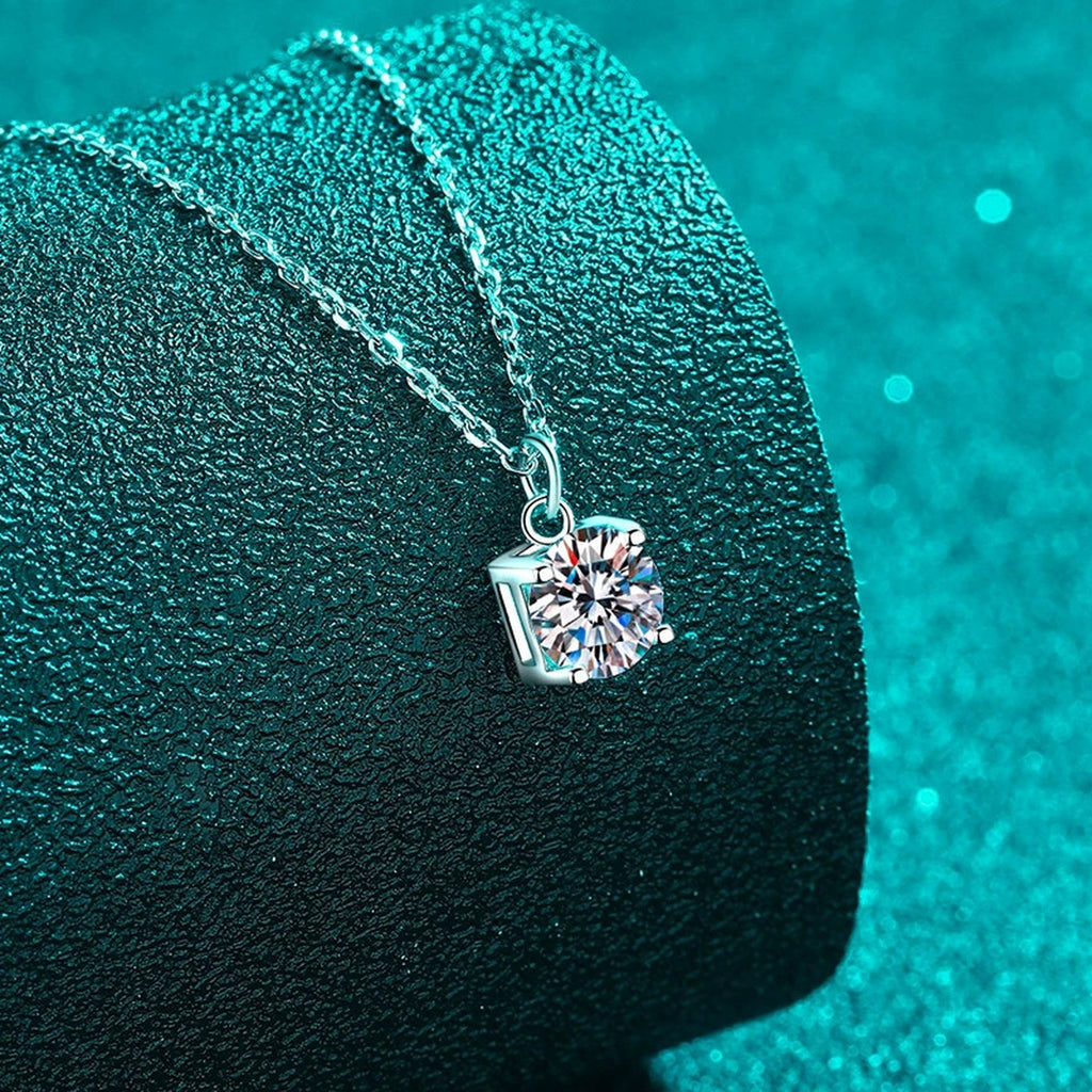Round Solitaire Moissanite Pendant Necklace in Rhodium-Plated S925 sterling silver angled product detail view