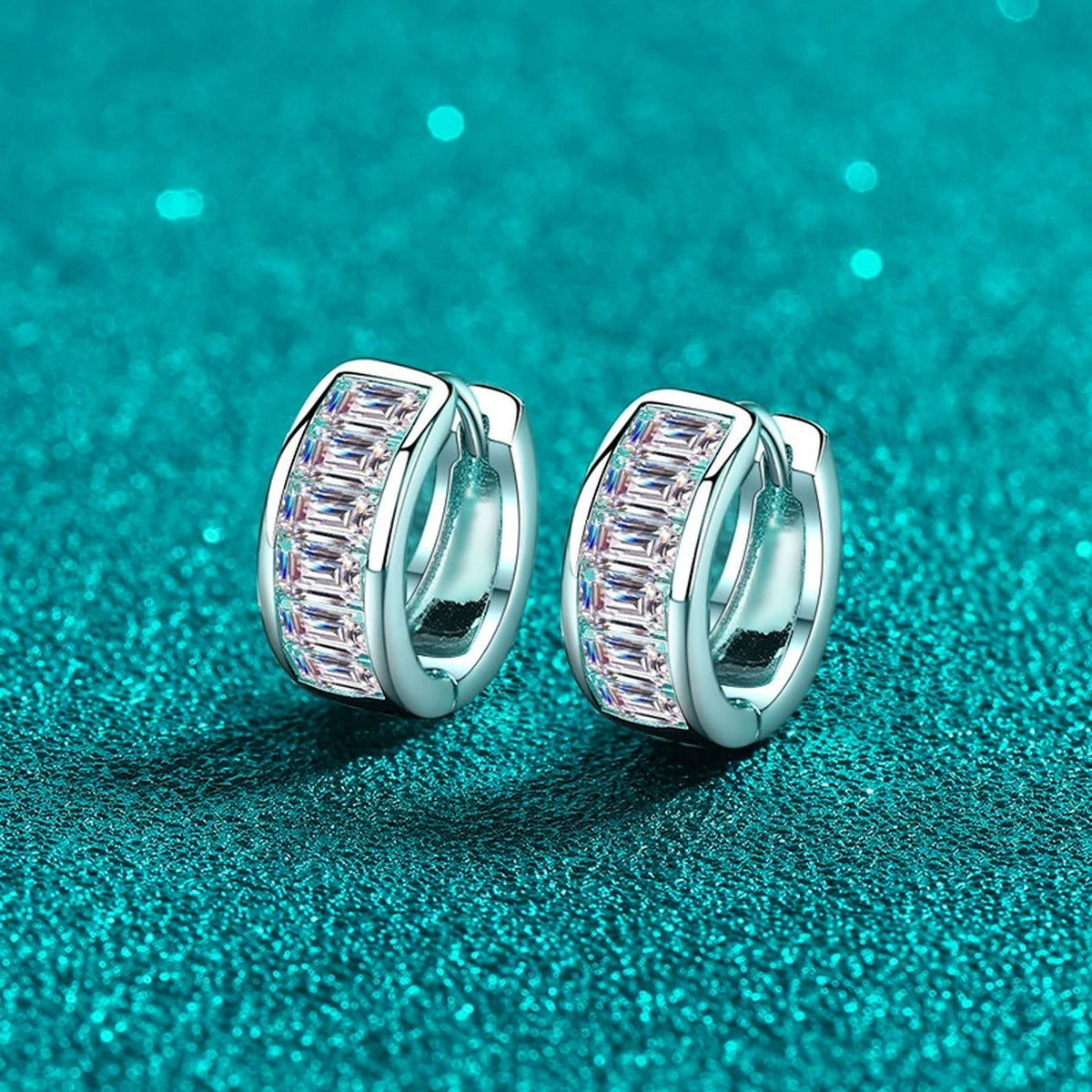 Emerald Cut Moissanite Huggie Hoop Earrings in Rhodium-Plated S925 sterling silver product scene view showing front sparkle