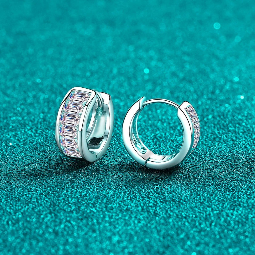 Emerald Cut Moissanite Huggie Hoop Earrings in Rhodium-Plated S925 sterling silver product scene view showing angled setting detail