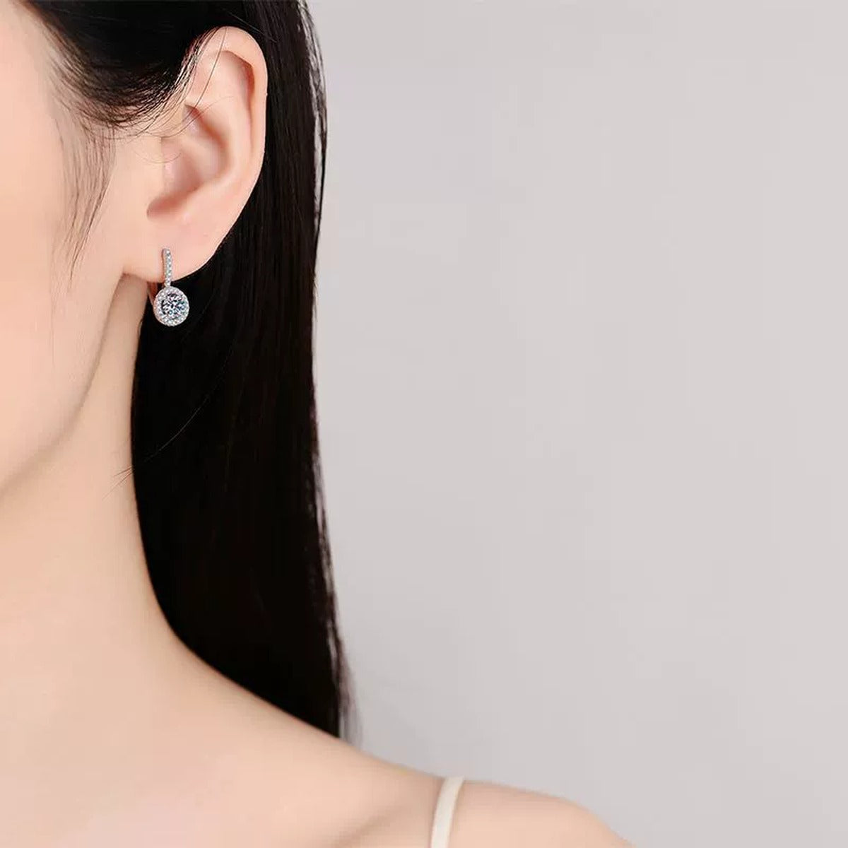 Round Moissanite Hoop Drop Earrings with CZ in Rhodium-Plated S925 sterling silver worn on ear by model showing scale, placement, and hoop drop earrings styling