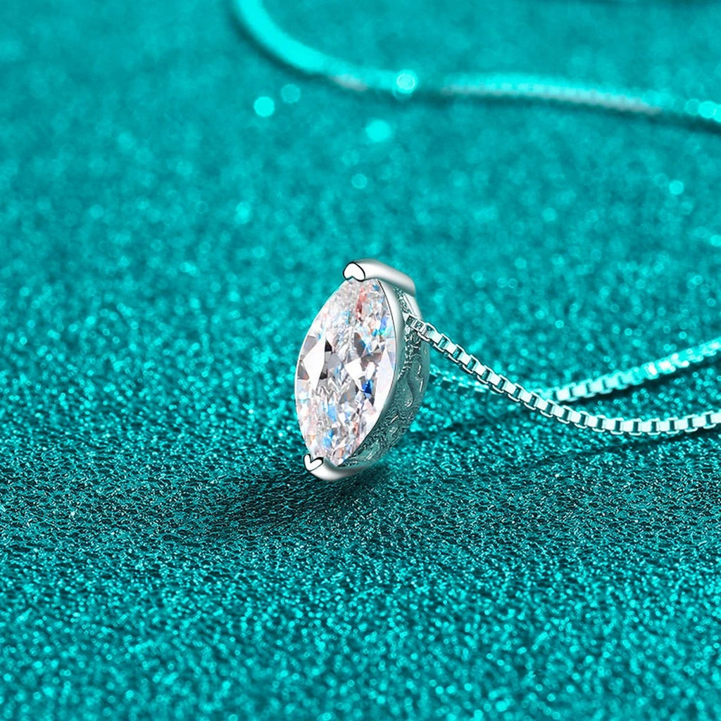 Marquise Solitaire Moissanite Pendant Necklace in Rhodium-Plated S925 sterling silver blue display scene showing chain and stone layout