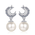 Crescent Star Pearl Moissanite Stud Dangle Earrings in Rhodium-Plated S925 sterling silver on white background showing the full pair, pearl and moissanite detail, and stud dangle earrings silhouette