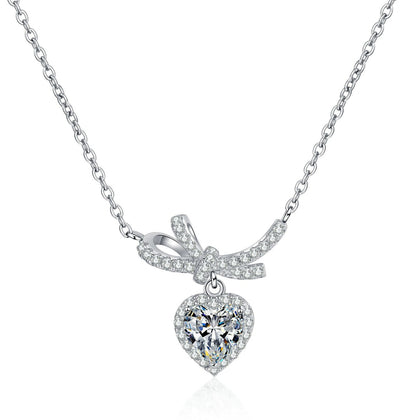 Heart Bow Moissanite Pendant Necklace with CZ in Rhodium-Plated S925 sterling silver white background product photo showing heart pendant with bow-like accents and a round moissanite center