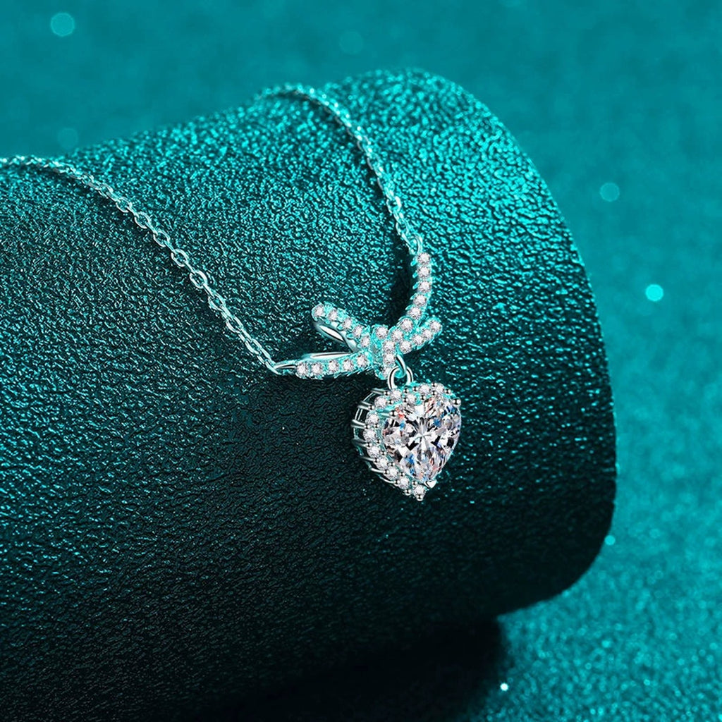 Heart Bow Moissanite Pendant Necklace with CZ in Rhodium-Plated S925 sterling silver close-up product scene showing pendant setting