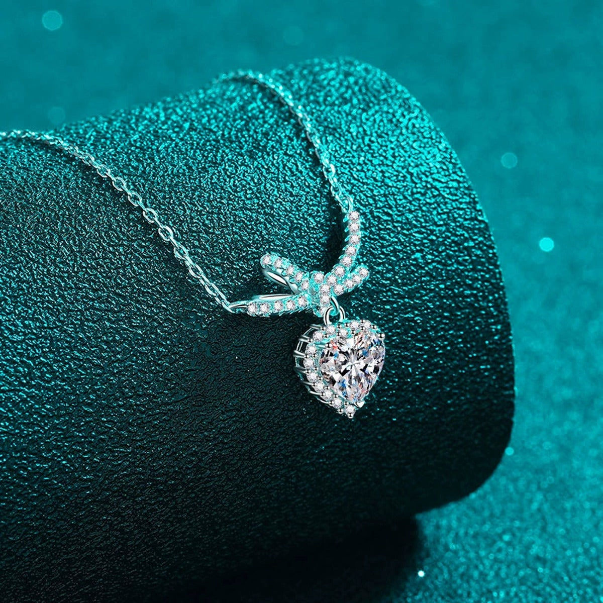 Heart Bow Moissanite Pendant Necklace with CZ in Rhodium-Plated S925 sterling silver close-up product scene showing pendant setting