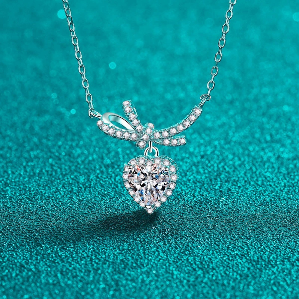 Heart Bow Moissanite Pendant Necklace with CZ in Rhodium-Plated S925 sterling silver display scene showing chain and stone layout