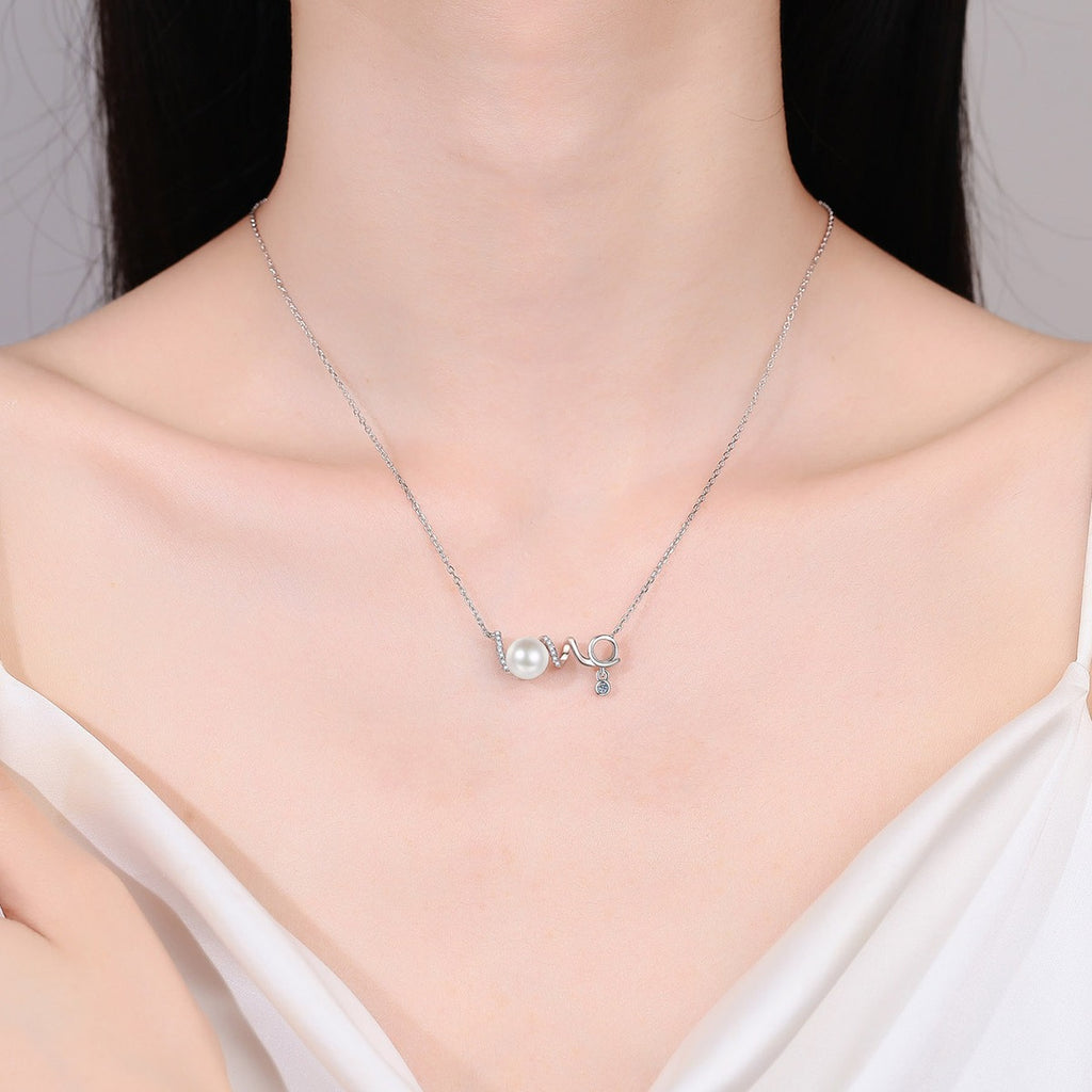 Love Moissanite Pearl Necklace in Rhodium-Plated S925 sterling silver neckline model view showing pendant scale and adjustable chain
