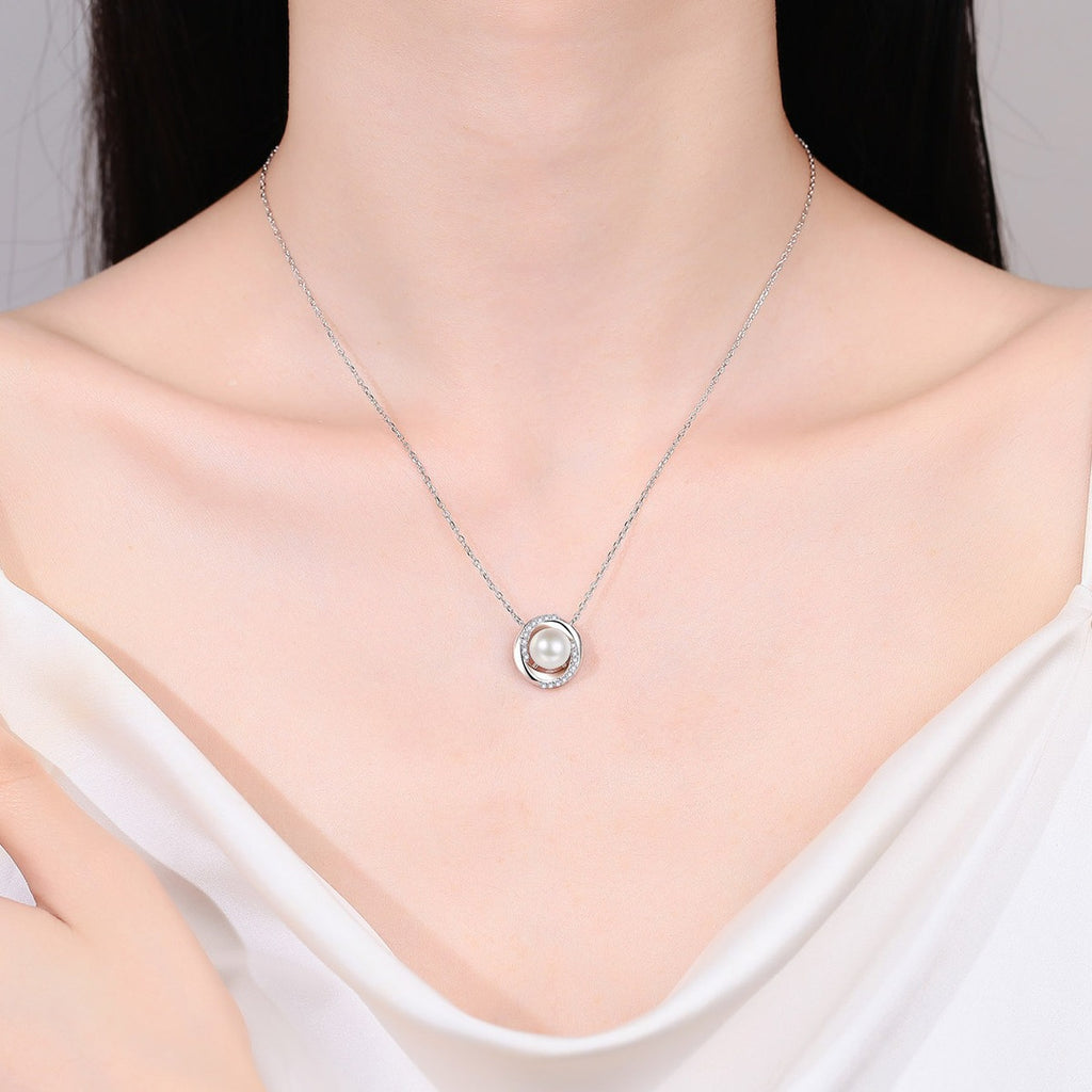 Circle Halo Moissanite Pearl Necklace in Rhodium-Plated S925 sterling silver neckline model view showing pendant scale and adjustable chain
