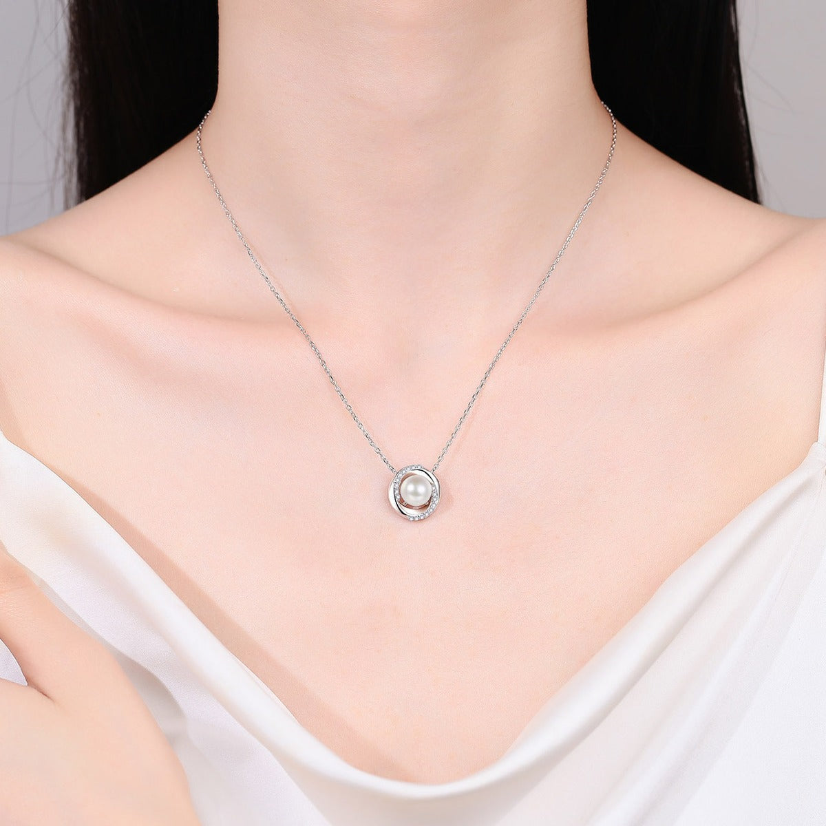 Circle Halo Moissanite Pearl Necklace in Rhodium-Plated S925 sterling silver neckline model view showing pendant scale and adjustable chain