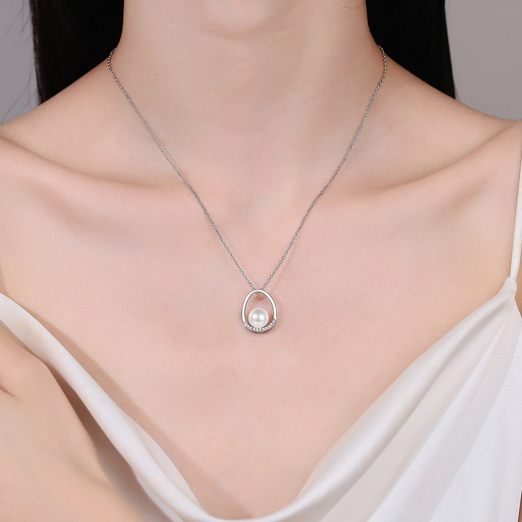 Open Teardrop Moissanite Pearl Necklace in Rhodium-Plated S925 sterling silver neckline model view showing pendant scale and adjustable chain