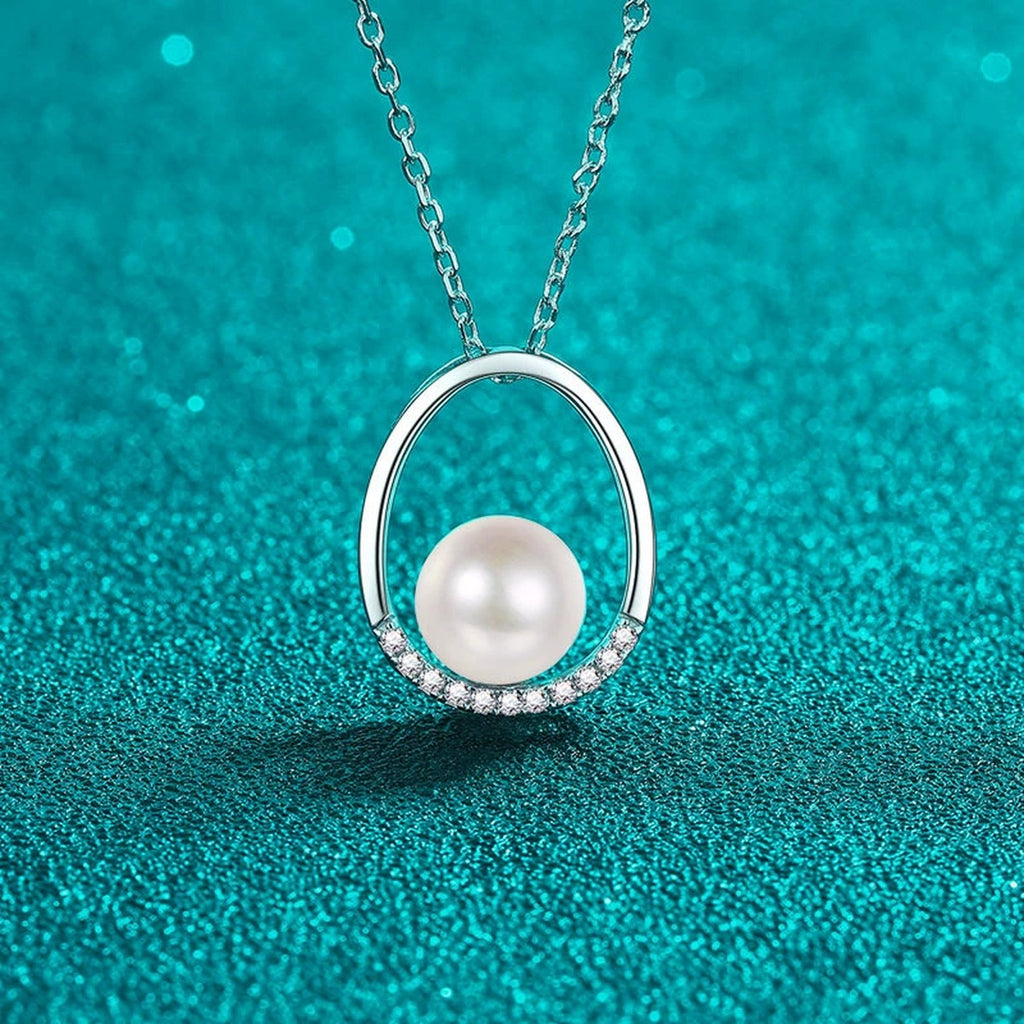 Open Teardrop Moissanite Pearl Necklace in Rhodium-Plated S925 sterling silver close-up product scene showing pendant setting