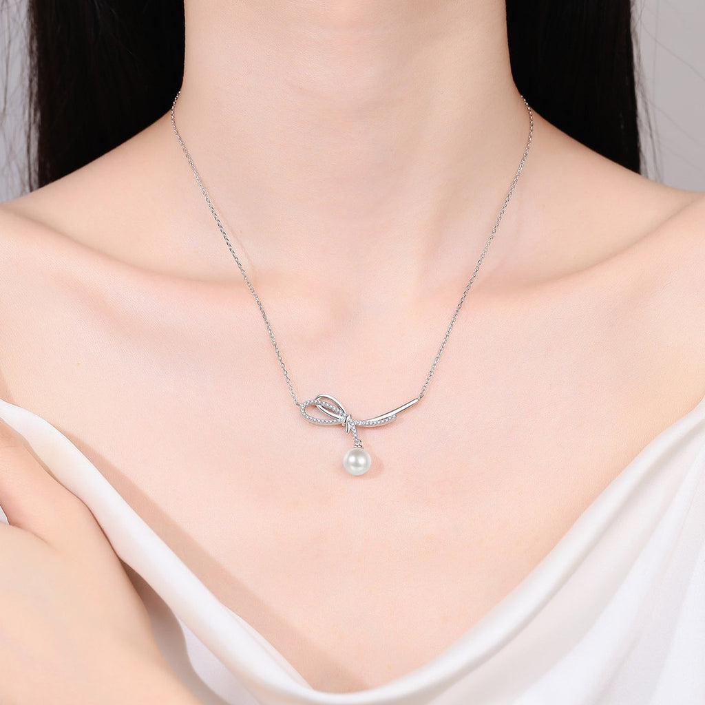 Ribbon Moissanite Pearl Necklace in Rhodium-Plated S925 sterling silver neckline model view showing pendant scale and adjustable chain