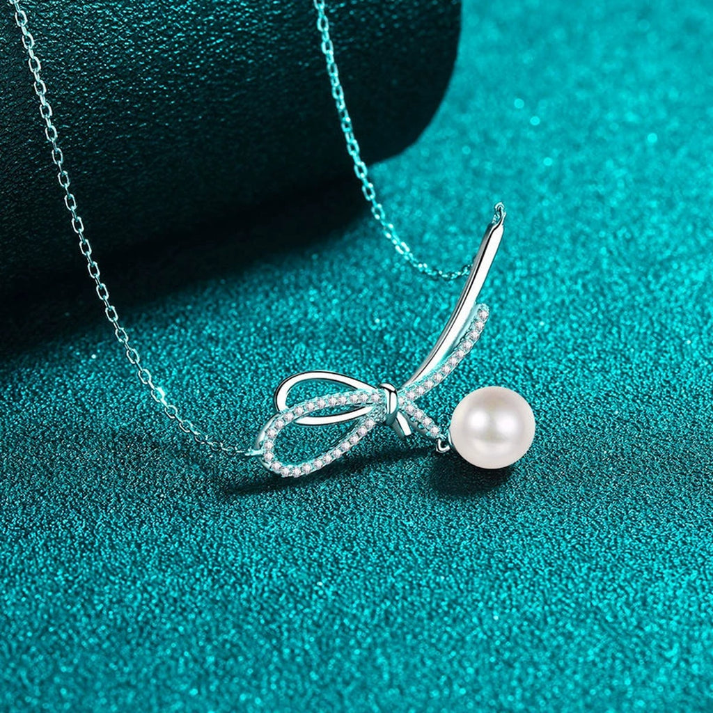 Ribbon Moissanite Pearl Necklace in Rhodium-Plated S925 sterling silver blue display scene showing chain and stone layout