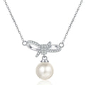 Ribbon Bow Moissanite Pearl Necklace in Rhodium-Plated S925 sterling silver white background product photo showing ribbon bow pearl pendant with round moissanite accents
