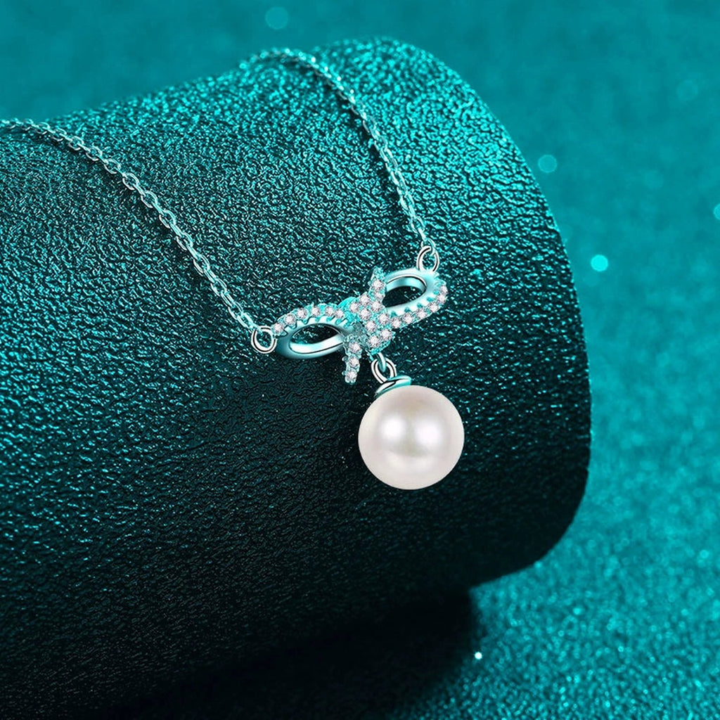 Ribbon Bow Moissanite Pearl Necklace in Rhodium-Plated S925 sterling silver angled product detail view