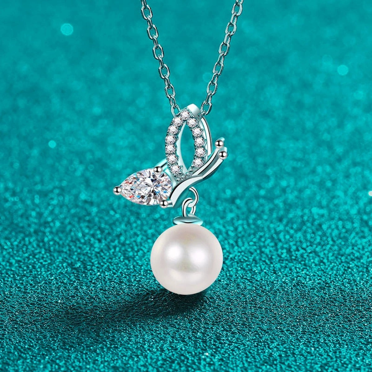 Butterfly Moissanite Pearl Necklace in Rhodium-Plated S925 sterling silver close-up product scene showing pendant setting