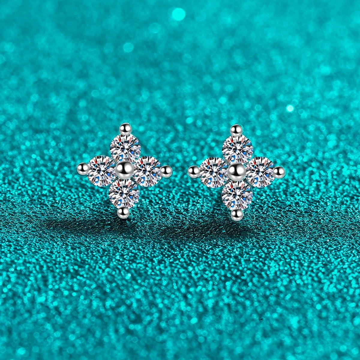 Starburst Moissanite Stud Earrings in Rhodium-Plated S925 sterling silver product scene view showing angled setting detail