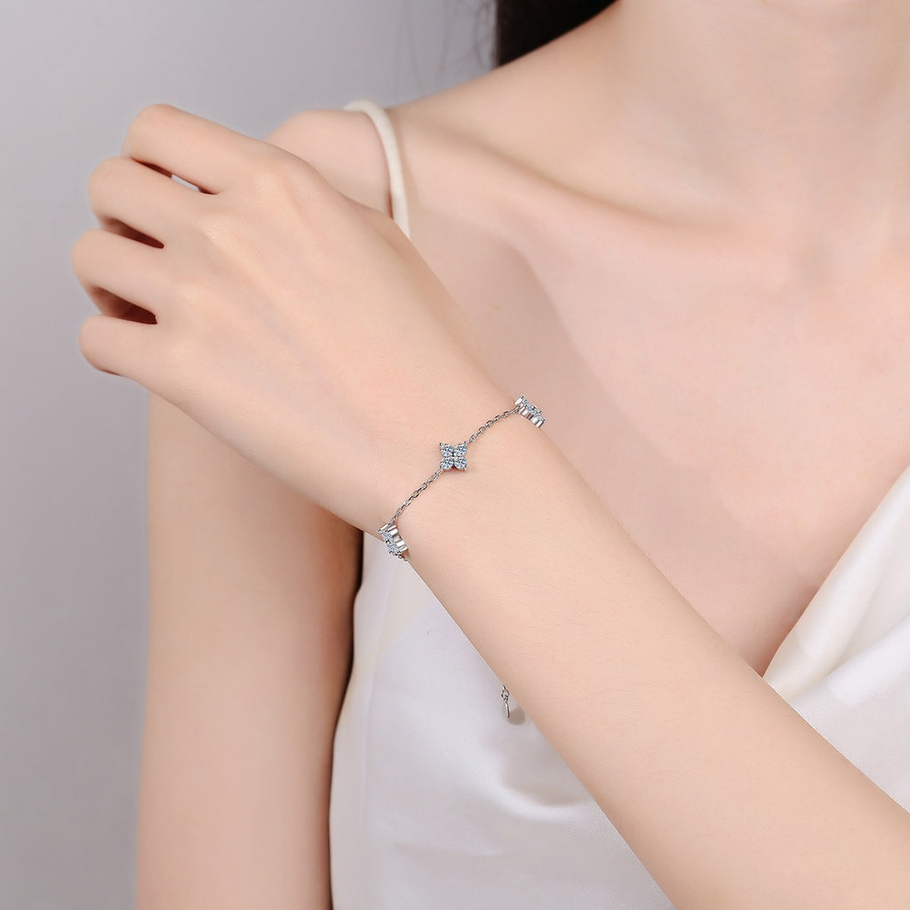 Clover Moissanite Adjustable Bracelet in Rhodium-Plated S925 sterling silver worn on wrist model view showing scale and adjustable fit