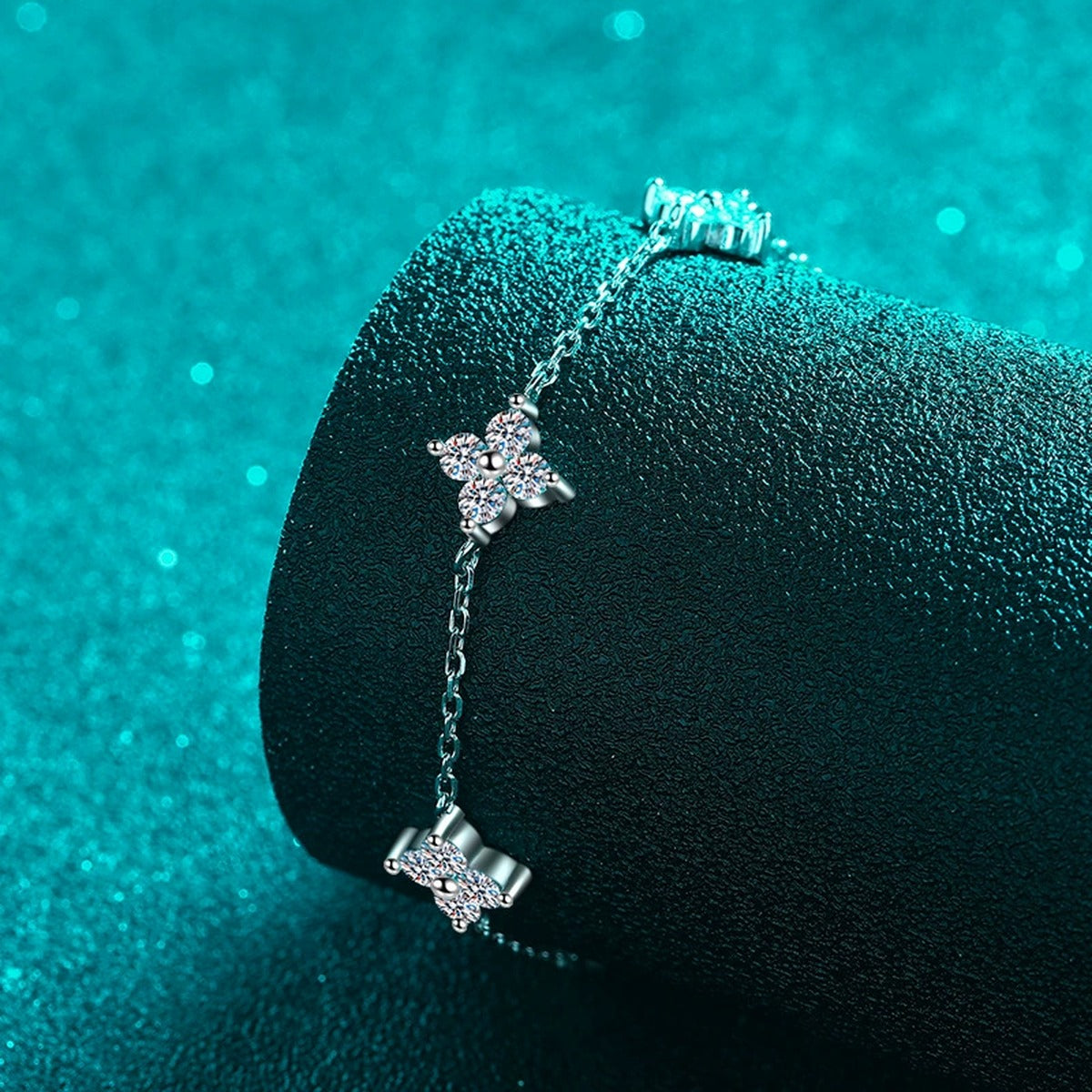 Clover Moissanite Adjustable Bracelet in Rhodium-Plated S925 sterling silver angled product display showing bracelet silhouette