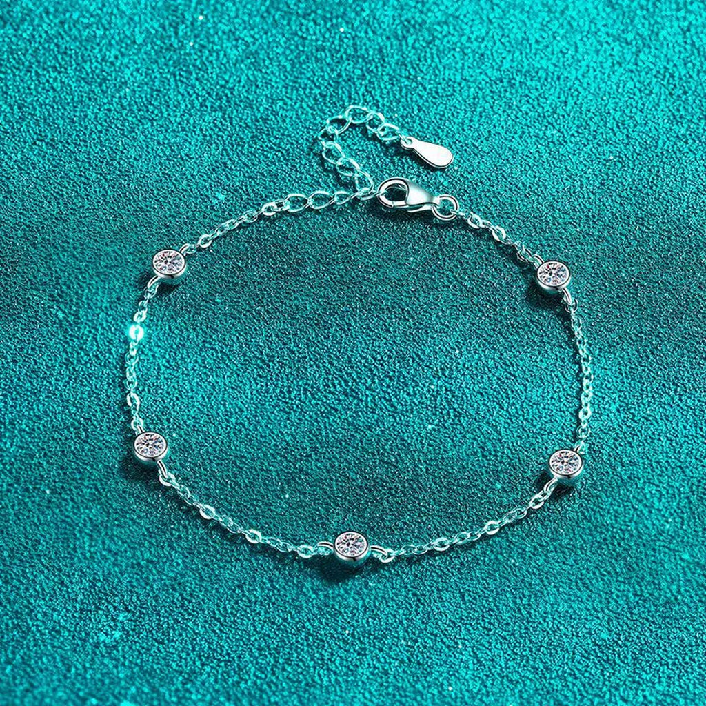 Beaded Moissanite Charm Bracelet in Rhodium-Plated S925 sterling silver angled product display showing bracelet silhouette