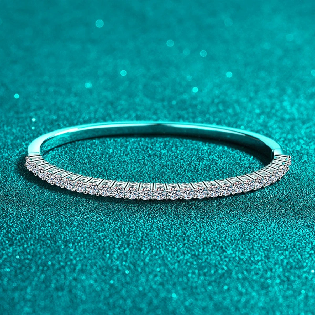 Round Moissanite Pave Bangle in Rhodium-Plated S925 sterling silver angled product display showing bangle silhouette