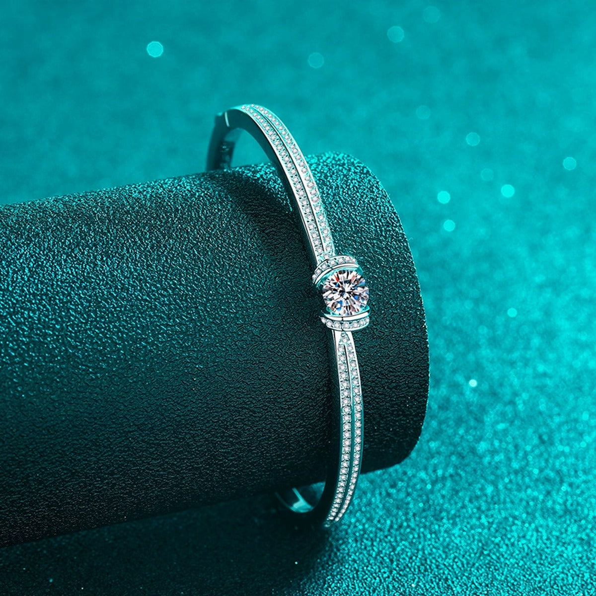 Round Moissanite Solitaire Bangle in Rhodium-Plated S925 sterling silver angled product display showing bangle silhouette