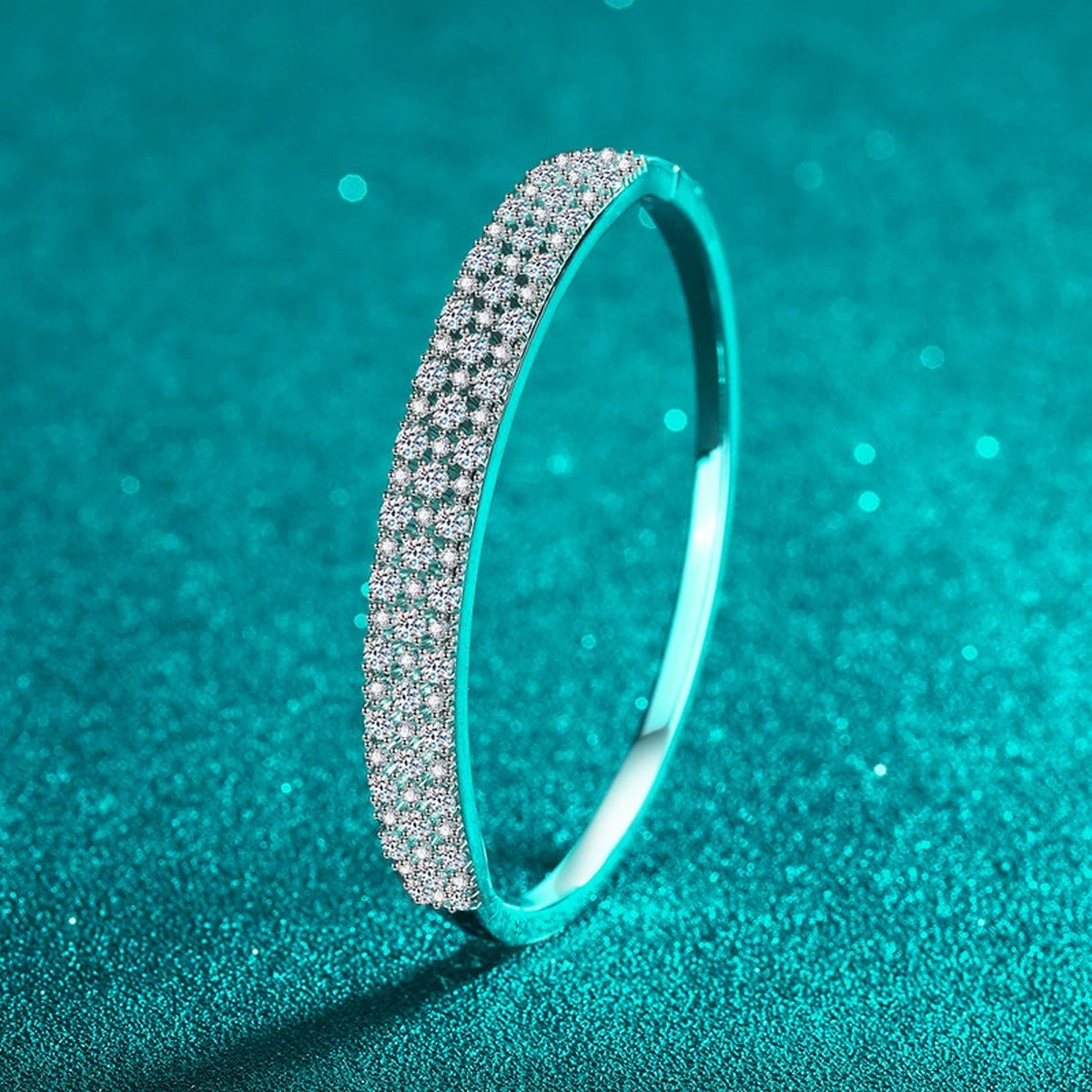 Wide Round Moissanite Pave Bangle in Rhodium-Plated S925 sterling silver styled product scene showing moissanite sparkle and bangle detail