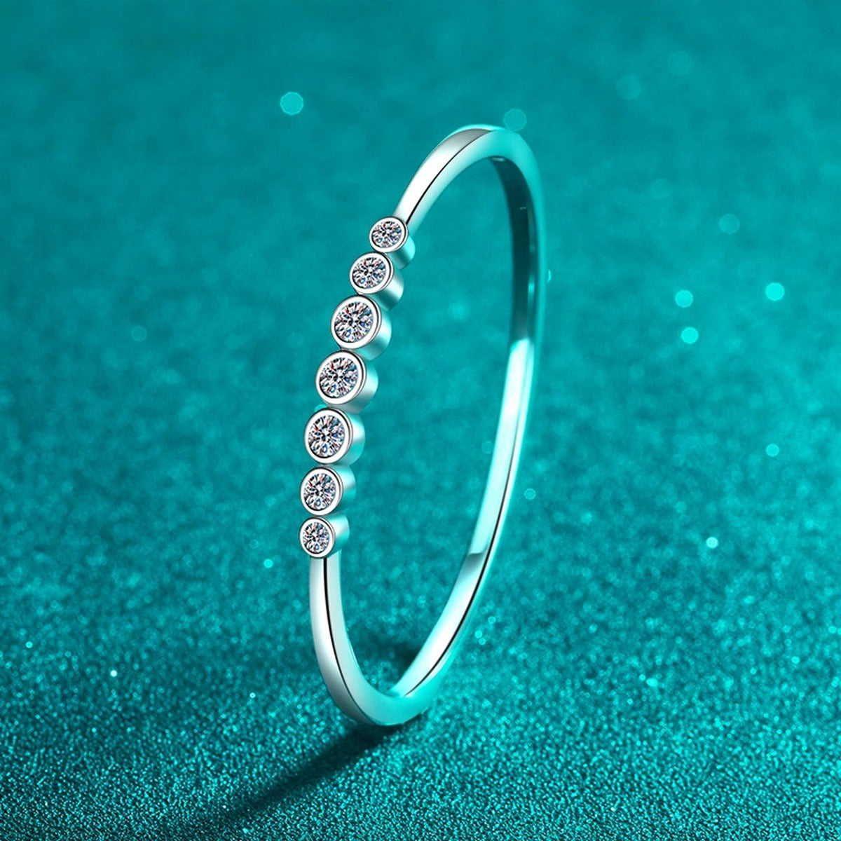 Beaded Round Moissanite Bangle in Rhodium-Plated S925 sterling silver styled product scene showing moissanite sparkle and bangle detail