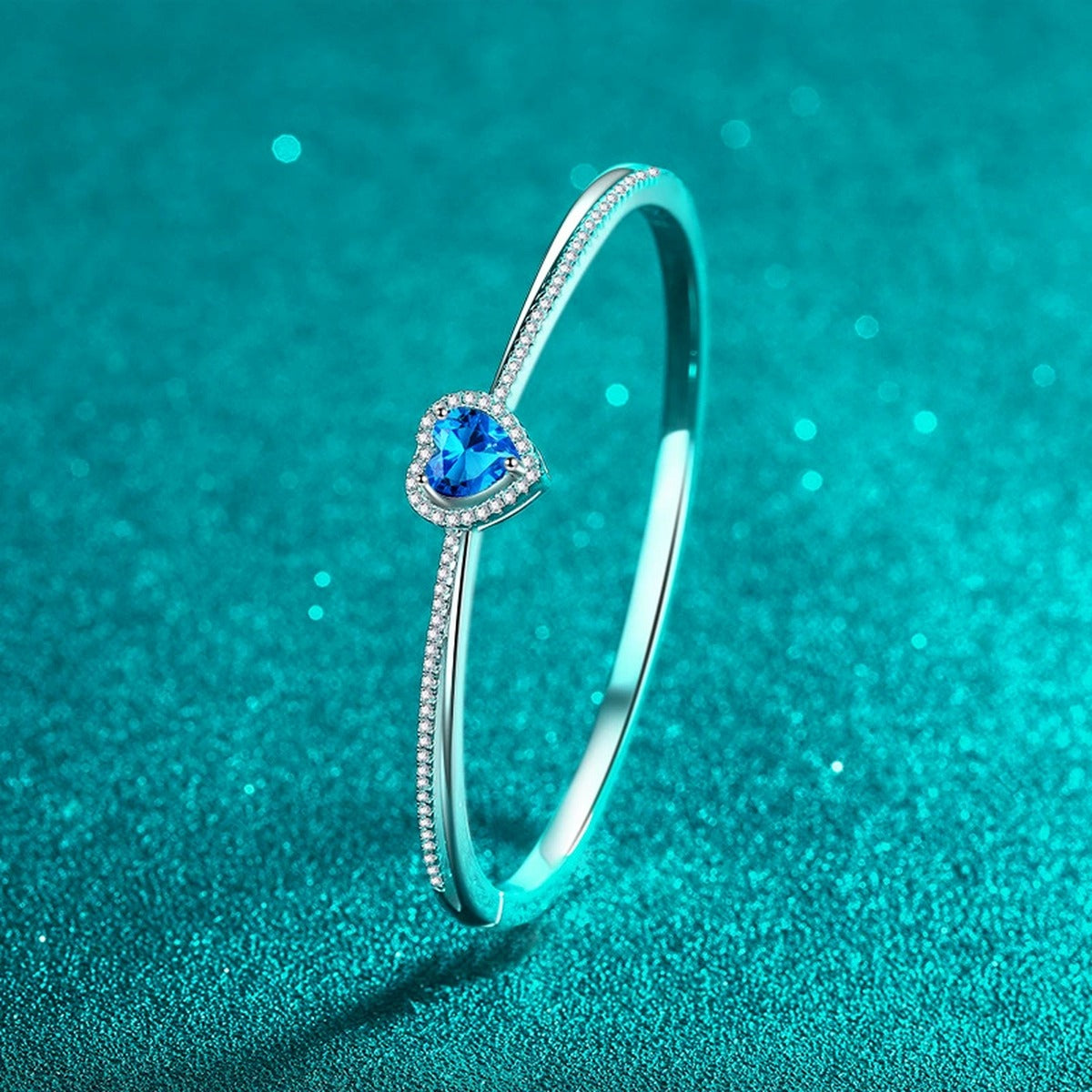 Heart-Cut Moissanite Bangle in Rhodium-Plated S925 sterling silver angled product display showing bangle silhouette