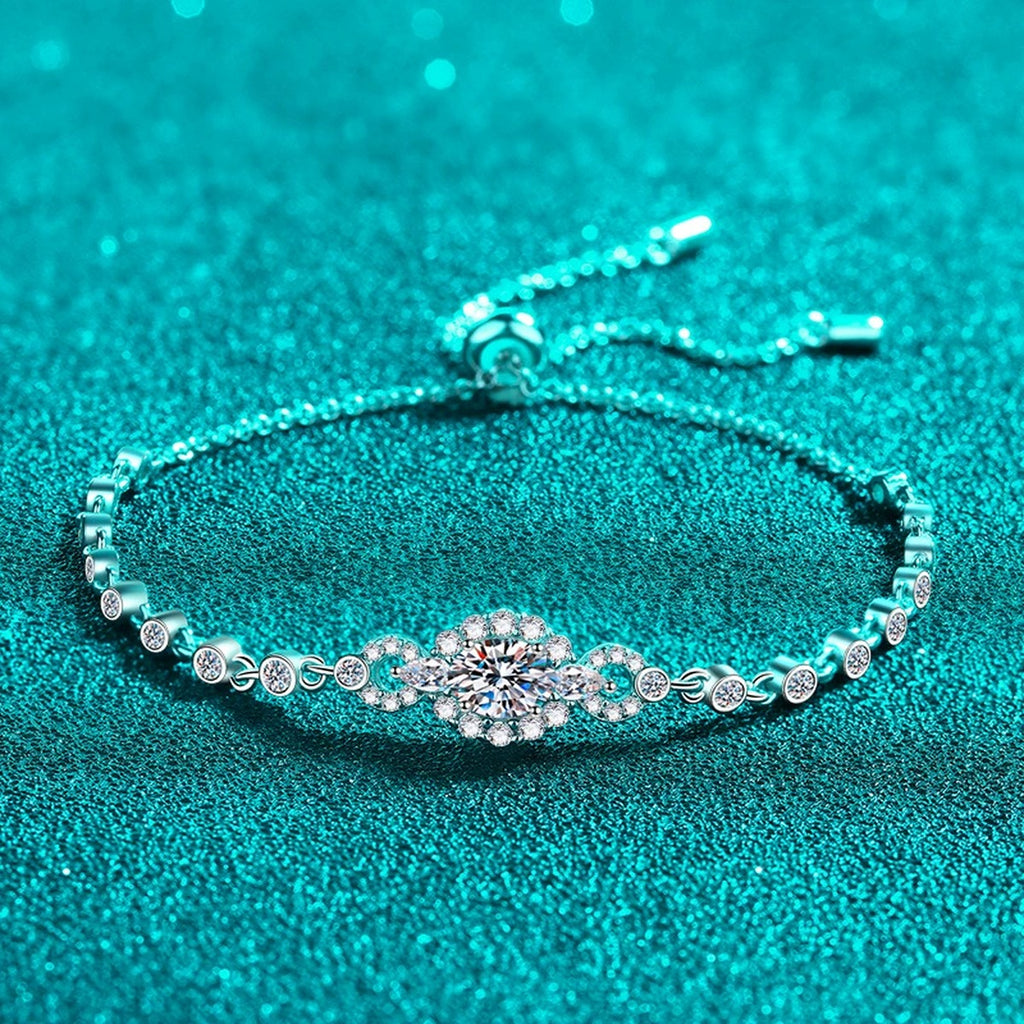 Oval Moissanite Tennis Bracelet with CZ in Rhodium-Plated S925 sterling silver styled product scene showing stone sparkle and chain detail