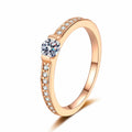 Round Moissanite Ring with CZ in champagne gold-plated S925 sterling silver on clean white background