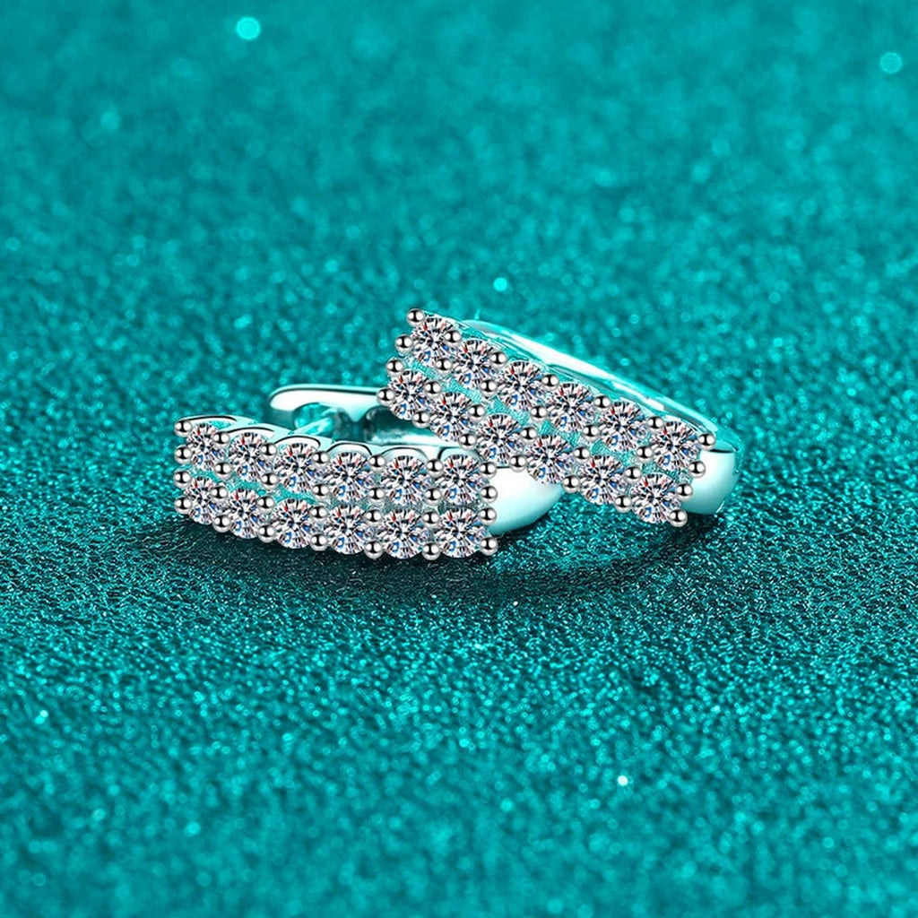 Pave Moissanite Huggie Hoop Earrings in Rhodium-Plated S925 sterling silver product scene view showing front sparkle