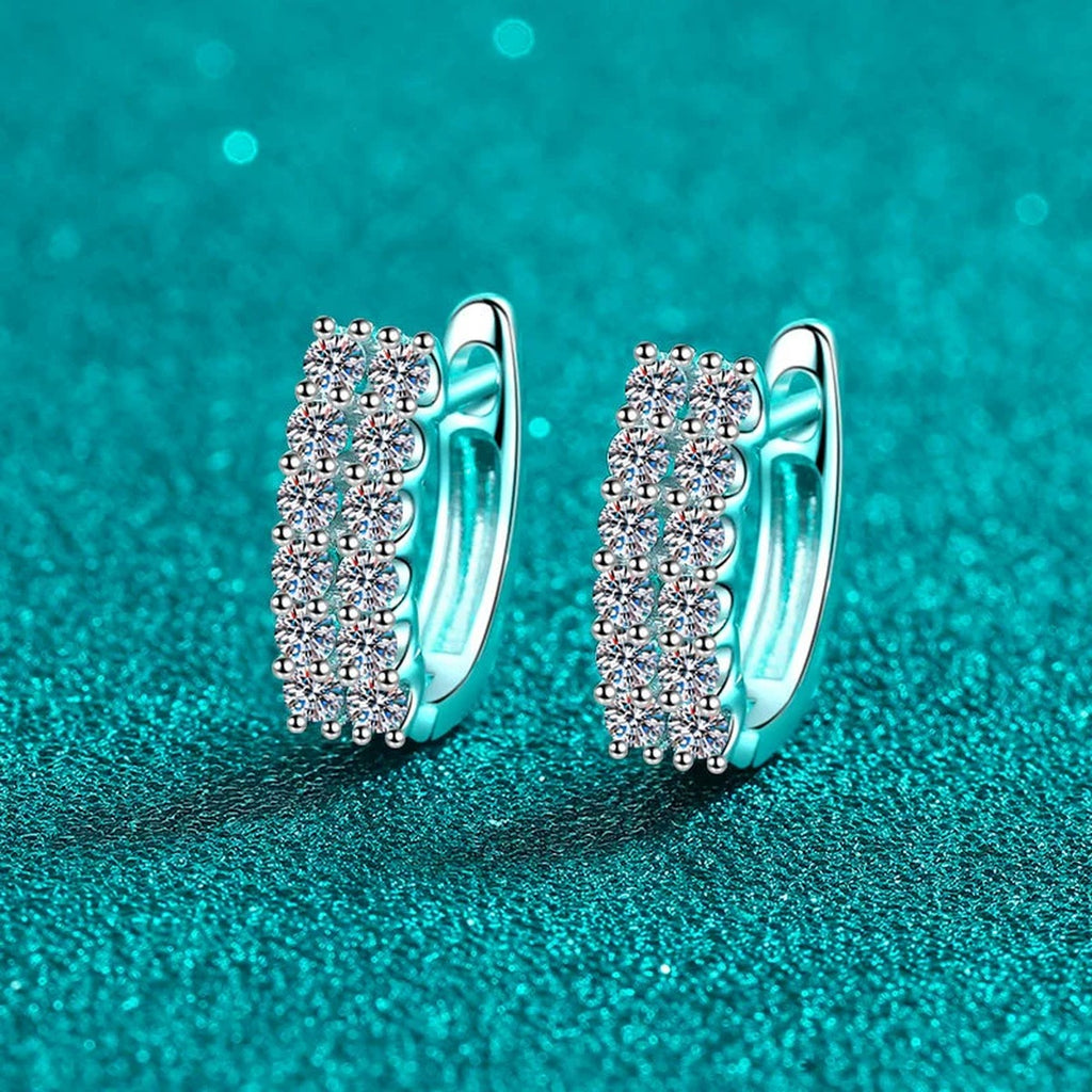 Pave Moissanite Huggie Hoop Earrings in Rhodium-Plated S925 sterling silver product scene view showing angled setting detail