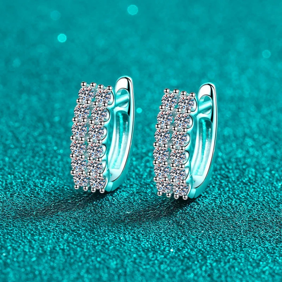 Pave Moissanite Huggie Hoop Earrings in Rhodium-Plated S925 sterling silver product scene view showing angled setting detail