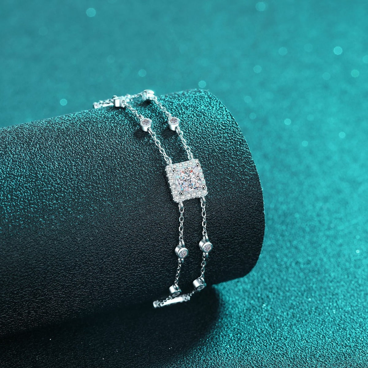 Princess Moissanite Charm Bracelet with CZ in Rhodium-Plated S925 sterling silver angled product display showing bracelet silhouette