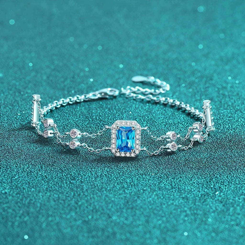Emerald and Radiant Moissanite Charm Bracelet with CZ in Rhodium-Plated S925 sterling silver close-up bracelet detail view showing clasp and motif
