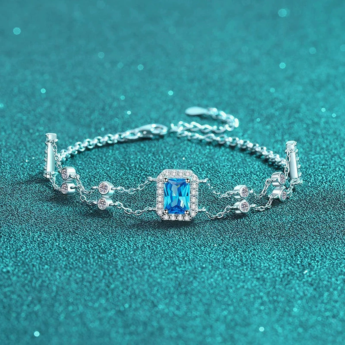 Emerald and Radiant Moissanite Charm Bracelet with CZ in Rhodium-Plated S925 sterling silver close-up bracelet detail view showing clasp and motif