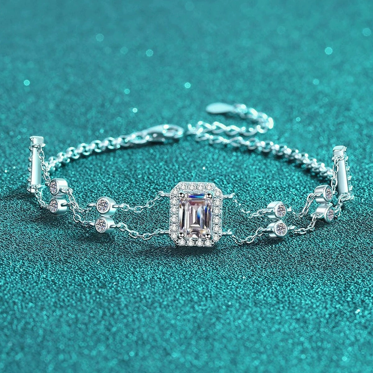 Emerald and Radiant Moissanite Charm Bracelet with CZ in Rhodium-Plated S925 sterling silver angled product display showing bracelet silhouette