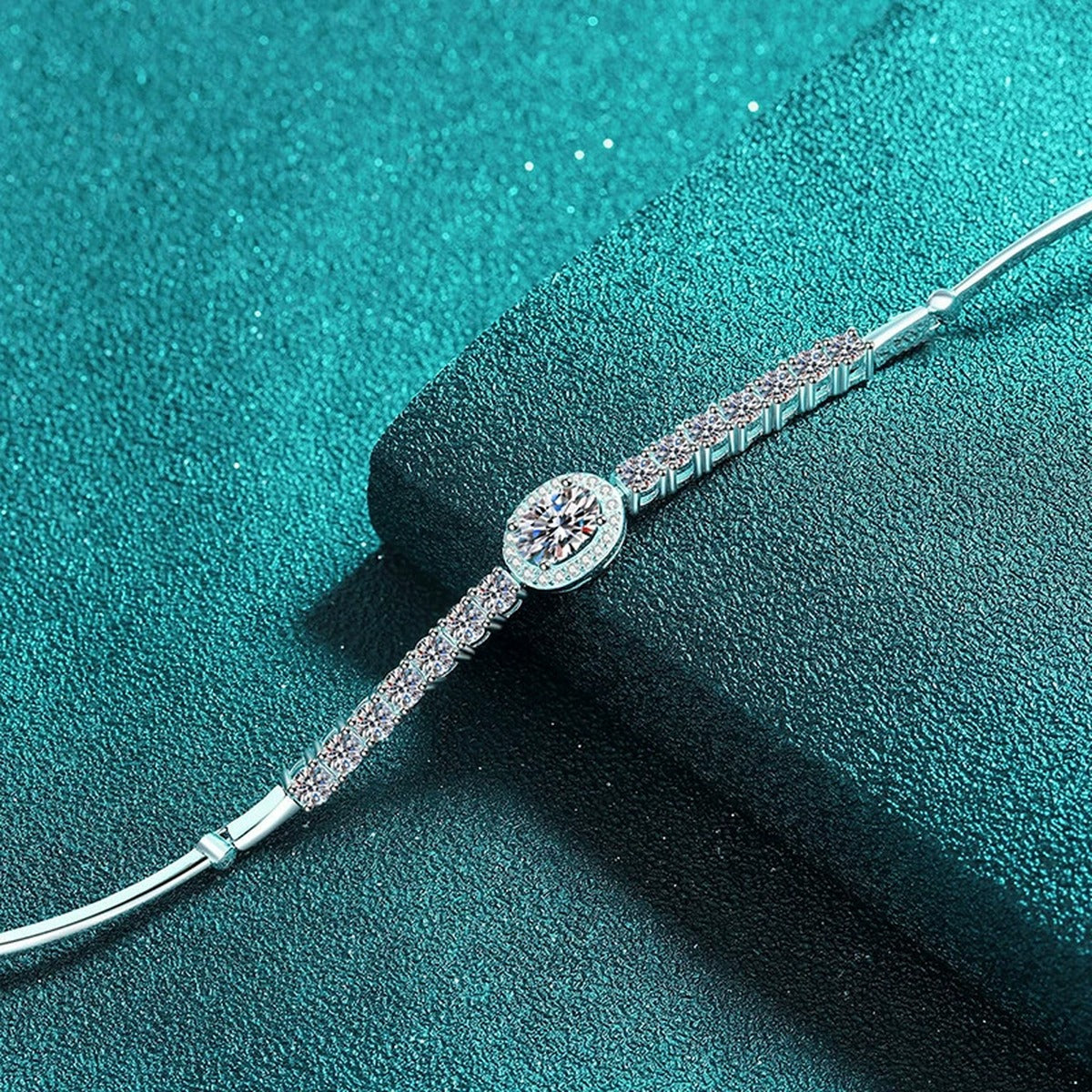 Oval and Round Moissanite Tennis Bracelet with CZ in Rhodium-Plated S925 sterling silver angled product display showing bracelet silhouette